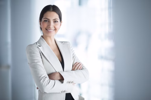 smiling-female-business-leader-with-arms-crossed_1262-3089 smiling-female-business-leader-with-arms-crossed_1262-3089