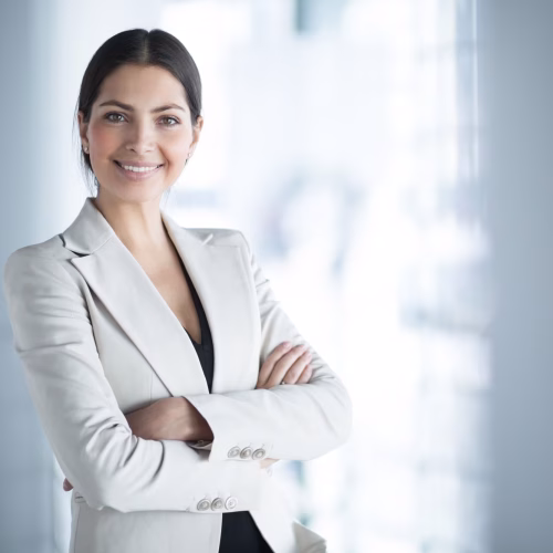 smiling-female-business-leader-with-arms-crossed_1262-3089